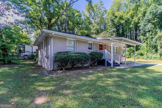 view of front of home with a front yard