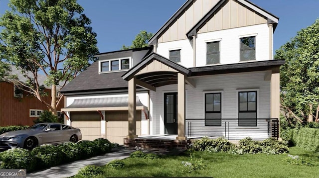 view of front facade with a front yard and a garage