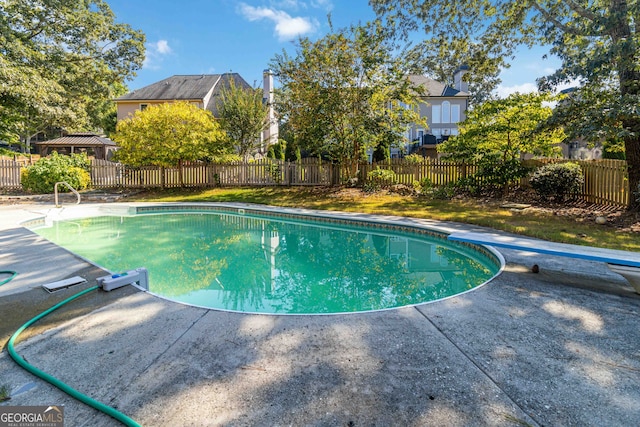 view of pool with a patio, a diving board, and a gazebo