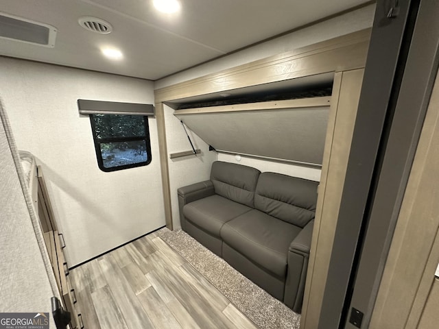 unfurnished living room with light wood-type flooring