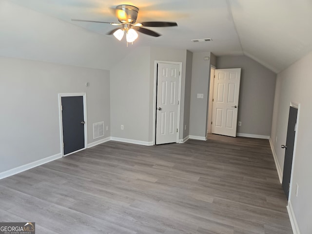 bonus room with ceiling fan, vaulted ceiling, and light hardwood / wood-style floors