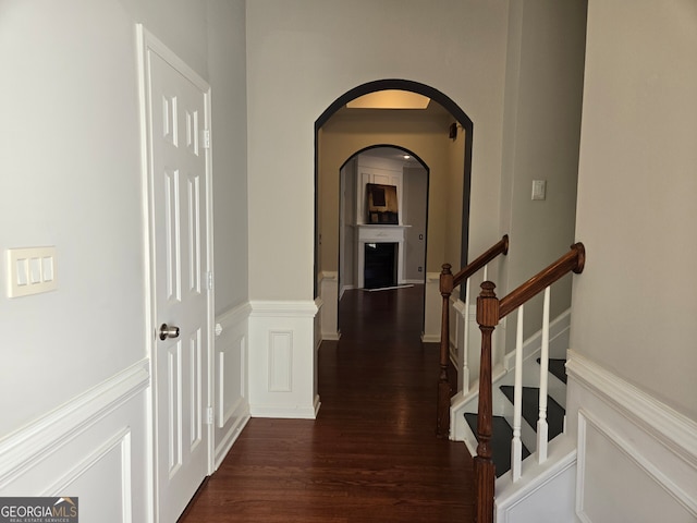 hallway featuring dark wood-type flooring