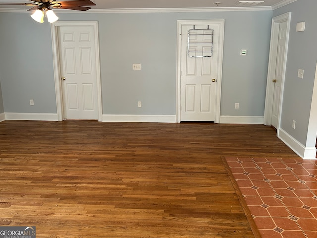 interior space featuring crown molding, ceiling fan, and dark wood-type flooring