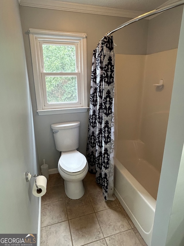 bathroom with ornamental molding, tile patterned floors, toilet, and shower / tub combo with curtain