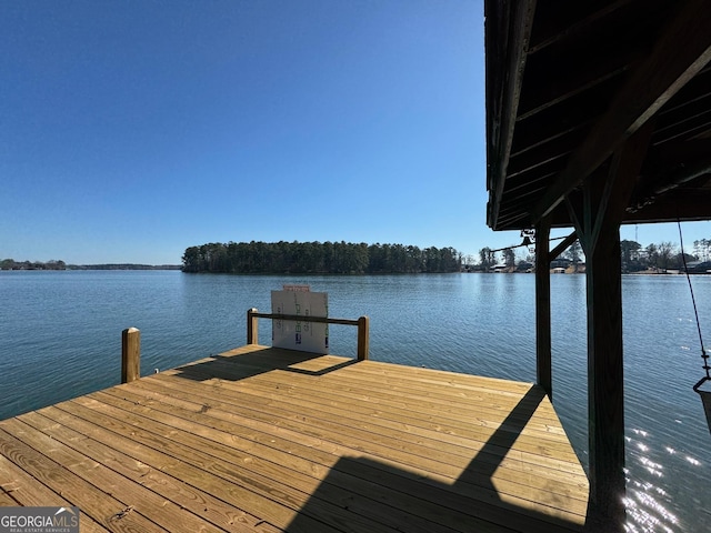 view of dock with a water view