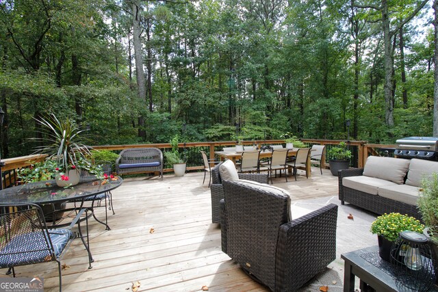 deck with an outdoor living space