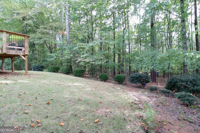 view of yard featuring a deck