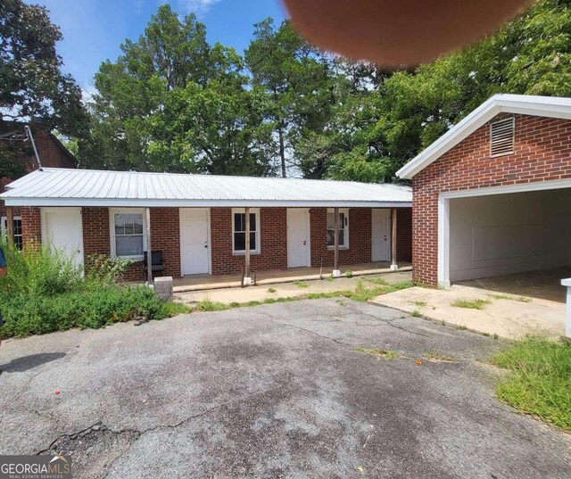 ranch-style home with a garage