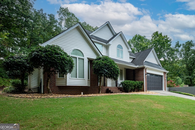 view of front property featuring a garage and a front lawn