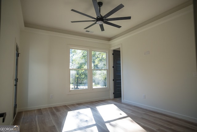 unfurnished room featuring ceiling fan and hardwood / wood-style floors