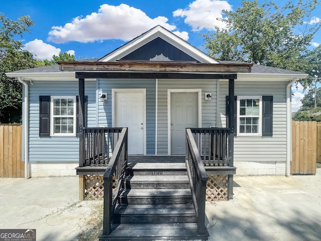 166 Gardner St, Macon, GA 31204 - view of front facade featuring fence, covered porch, and a shingled roof