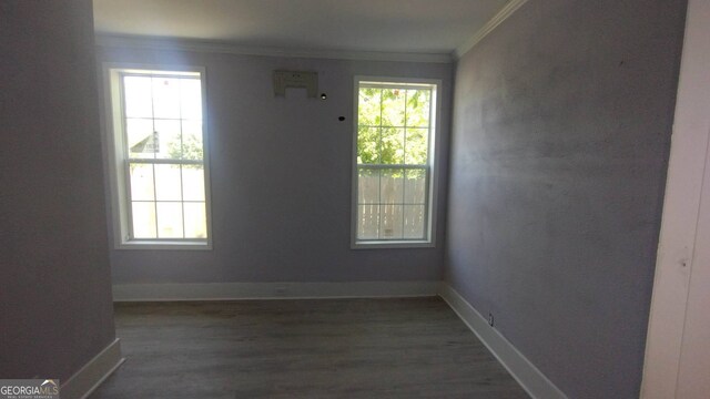 166 Gardner St, Macon, GA 31204 - unfurnished room featuring wood finished floors, crown molding, and baseboards