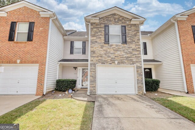 front of property featuring a garage