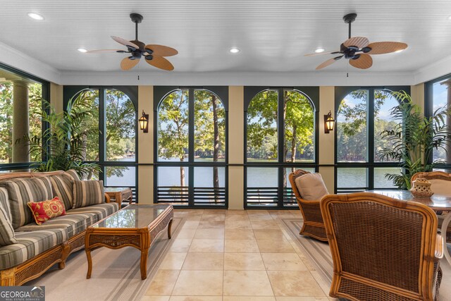 sunroom / solarium with ceiling fan