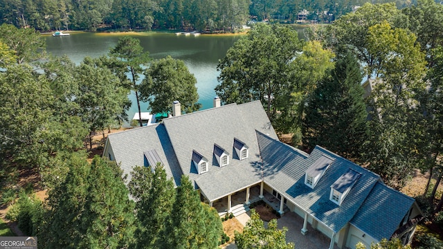 bird's eye view with a water view