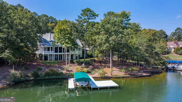 view of dock with a water view