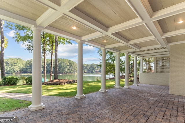 view of patio / terrace with a water view