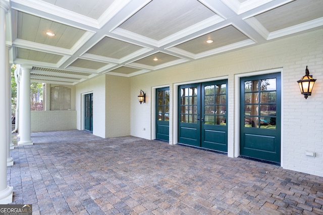 property entrance with french doors and a patio area