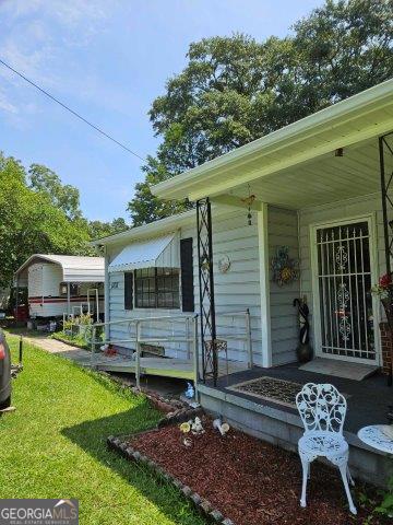 exterior space with a yard