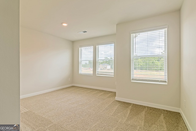 view of carpeted spare room