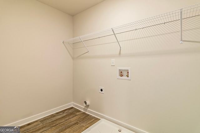 laundry room featuring washer hookup, electric dryer hookup, and hardwood / wood-style flooring