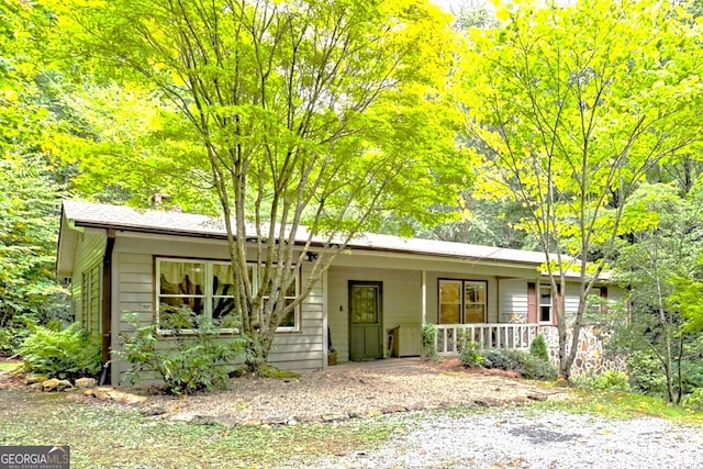 ranch-style house featuring a porch