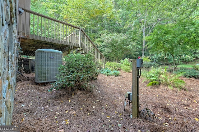 view of yard featuring central AC unit