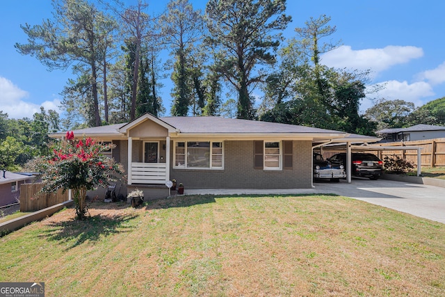 ranch-style home with a carport, covered porch, and a front yard