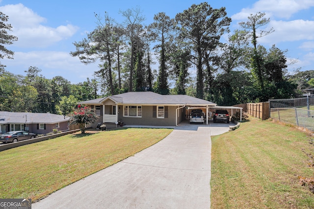 single story home with a front yard and a carport