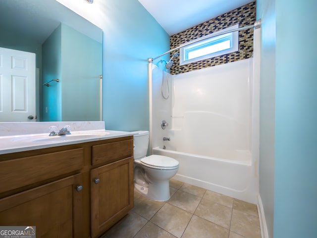 full bathroom with vanity, bathing tub / shower combination, toilet, and tile patterned floors