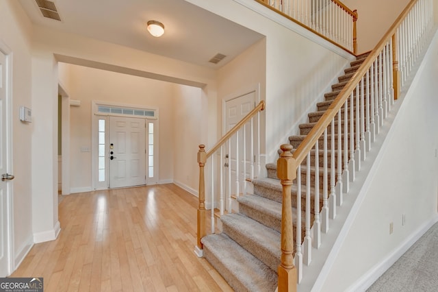 foyer entrance featuring light hardwood / wood-style flooring