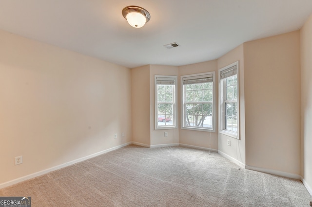 view of carpeted spare room