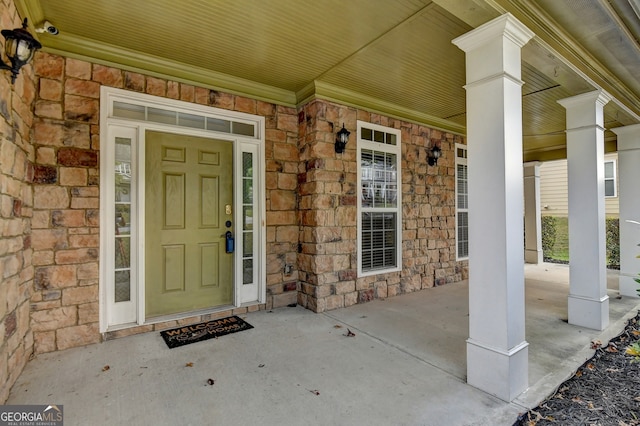 doorway to property with a porch