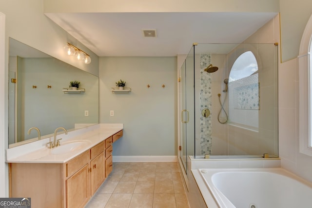 bathroom with independent shower and bath, tile patterned flooring, and vanity