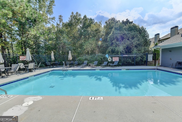 view of pool with a patio area