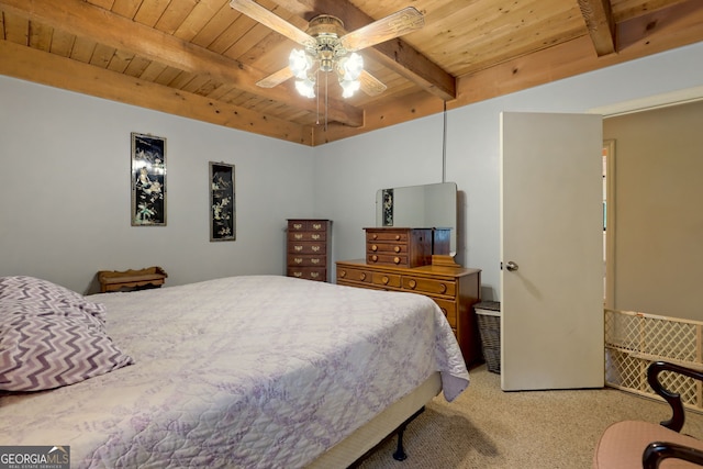 carpeted bedroom featuring ceiling fan, beamed ceiling, and wooden ceiling