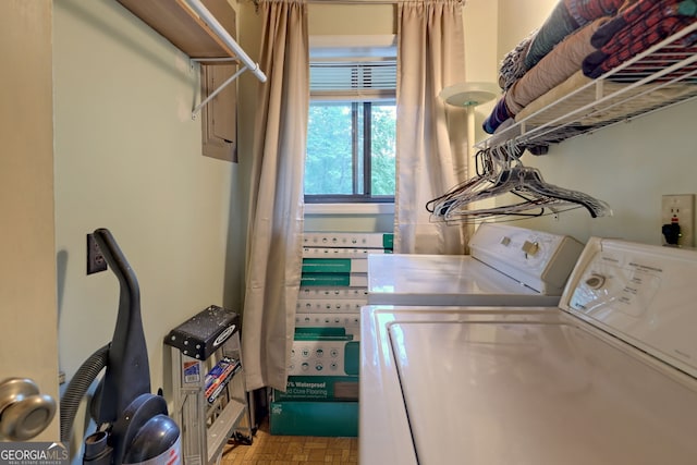 laundry area with washing machine and dryer