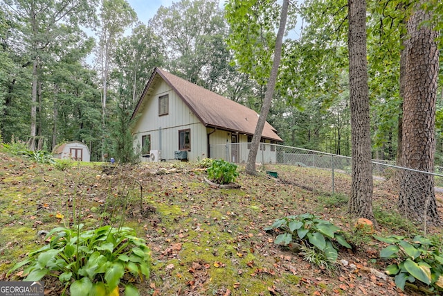 exterior space featuring a storage shed