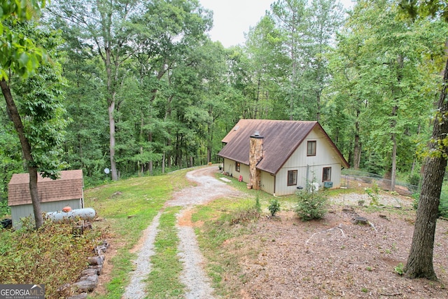 exterior space featuring a storage shed