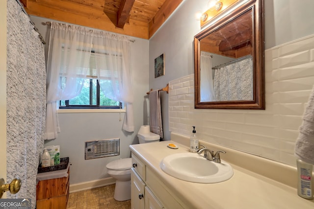 bathroom with vanity, beamed ceiling, heating unit, wooden ceiling, and toilet