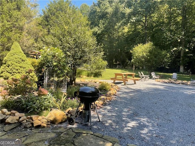 view of home's community featuring a patio area