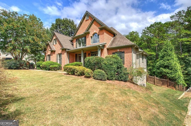 view of front of home with a front yard