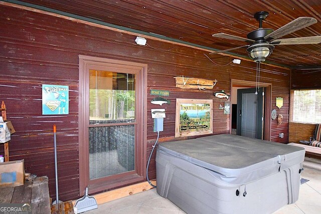 1625 Brushy Mountain Rd, Rockmart, GA 30153 - interior space with wooden ceiling, tile patterned flooring, wood walls, and ceiling fan