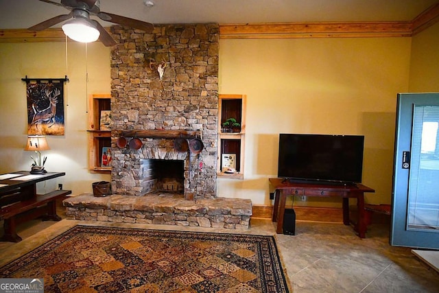 living room with tile patterned flooring, ceiling fan, and a fireplace