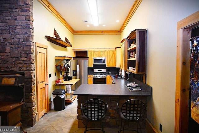 office area with sink, light tile patterned floors, and crown molding