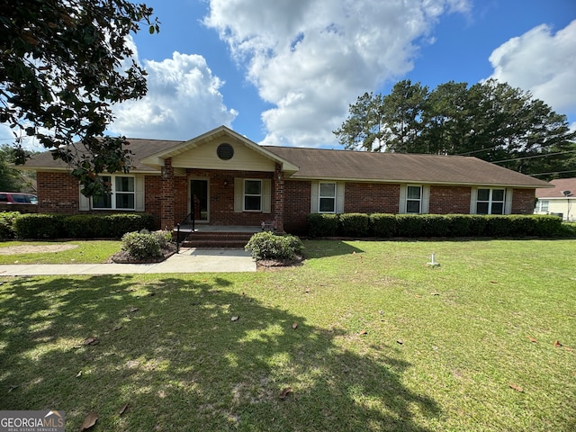 ranch-style house with a front lawn