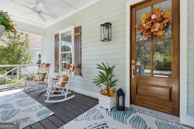 deck featuring ceiling fan and covered porch