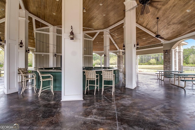 view of patio / terrace featuring outdoor wet bar and a ceiling fan