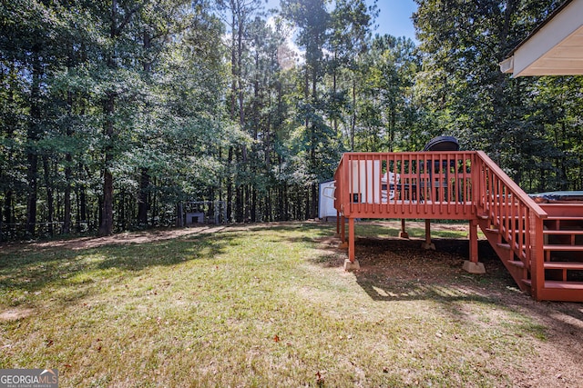 view of yard featuring a wooden deck