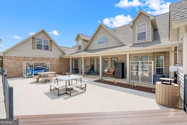 rear view of property with a patio area